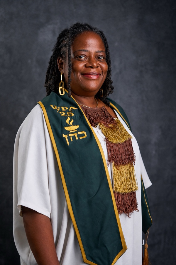 A WPA ’25 graduate in his ceremony stole
